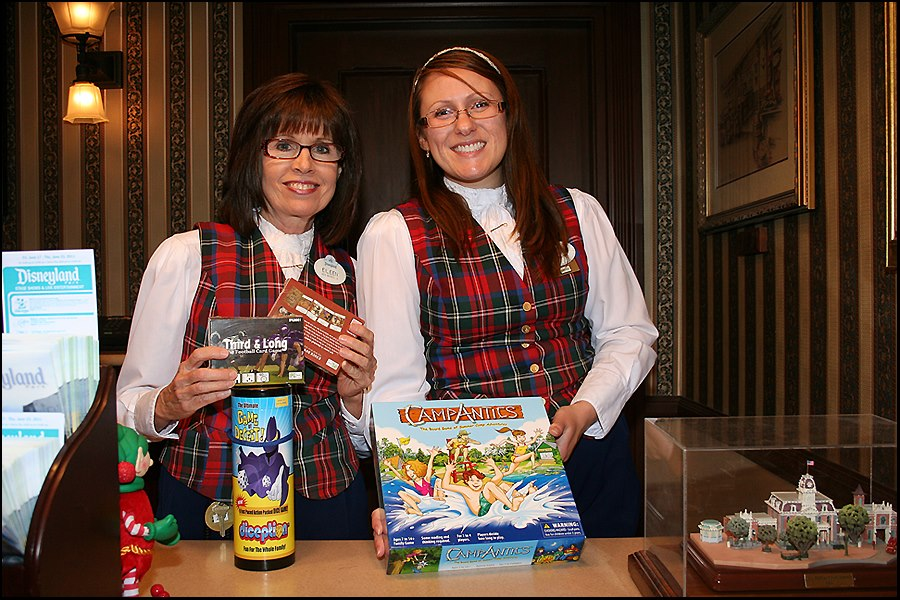 Disneyland Staff holding products that are The Toy Man® Seal of Approval recipients.