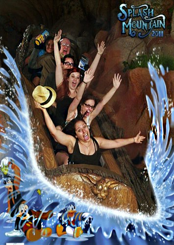 The Toy Man® holding Seal of Approval products in the air while riding Splash Mountain at Disneyland